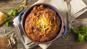 Homemade Refried Pinto Beans with Chiips and Lime