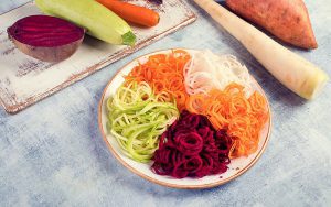 Vegetable noodles. Fresh zucchini, carrot, white radish, sweet potato and beet root pasta